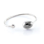 Xtinctio - Bangle Hand made in Italy, eco conscious, 925 sterling silver and enamel. Imbued with the spirit of the endangered Elephant and serving as a constant reminder that in this age of extinction,