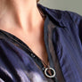 Xtinctio Necklace Eco friendly cotton linen blend waxed cord sourced in Italy. Amulet individually hand forged in Italy from White Bronze and grey enamel in honor of the majestic elephant.