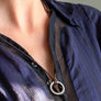 Xtinctio Necklace Amulet individually hand forged in Italy from White Bronze and green Etruscan Enamel in honor of the Rainforest. Eco friendly cotton linen blend waxed cord sourced in Italy.