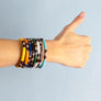 Xtinctio - Stretch Bangle comfortable, timeless and chic Hand made in Italy by a 3rd generation Goldsmith Triple dipped Palladium and black enamel Imbued with the spirit of the endangered Rhinoceros