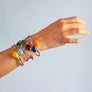 Xtinctio - Bangle Hand made in Italy by a 3rd generation Goldsmith. 925 sterling silver Triple dipped Palladium and turquoise enamel. Imbued with the spirit of the Ocean
