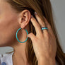 Xtinctio - Hand made in Italy by a 3rd generation Goldsmith. Eco conscious white Bronze and navy blue enamel designed for the majestic Whale. 50% of all profits go towards protecting the most endangered species on the planet earth.