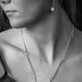Sterling silver Ball Hook pendant Earring with blue Chalcedony representing your commitment to protecting these critically endangered species and their habitats.
