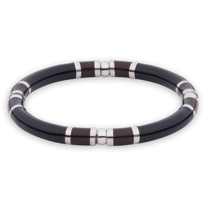 Xtinctio - Stretch Bangle comfortable, timeless and chic Hand made in Italy by a 3rd generation Goldsmith  Triple dipped Palladium and  black enamel Imbued with the spirit of the endangered Rhinoceros