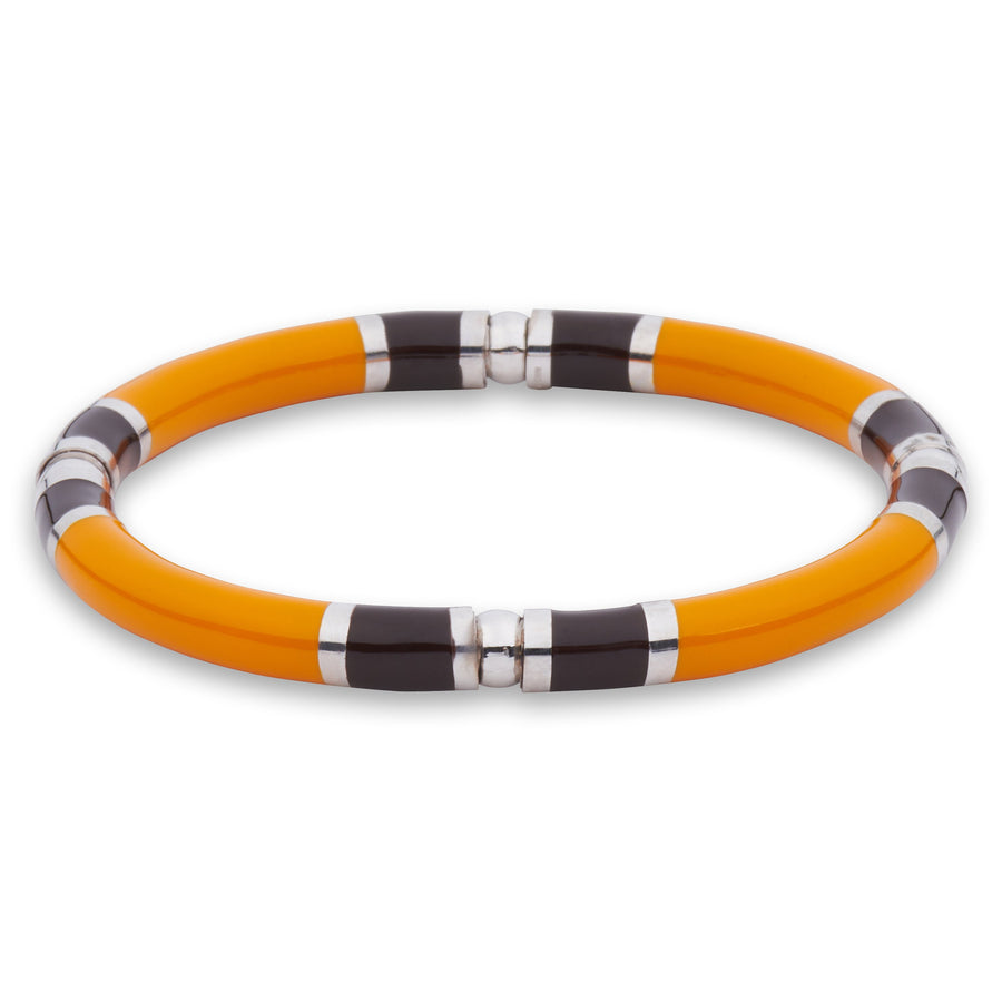  Xtinctio Stretch Bangle comfortable, timeless and chic Hand made in Italy by a 3rd generation Goldsmith  Triple dipped Palladium and Orange enamel.  Imbued with the spirit of the endangered Orangutan 
