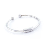 Xtinctio - Bracelet/Bangle made in Italy Recycled Sterling silver Love XX bracelet eco conscious, chic and comfortable representing your commitment to protecting these critically endangered species and their habitats. An  X  at each end of the bangle and bead with the  word Love debossed  on it. 