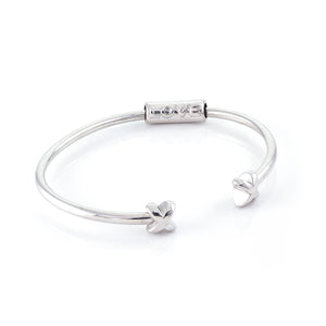 Xtinctio - Bracelet/Bangle made in Italy Recycled Sterling silver Love XX bracelet eco conscious, chic and comfortable representing your commitment to protecting these critically endangered species and their habitats. An  X  at each end of the bangle and bead with the  word Love debossed  on it.  