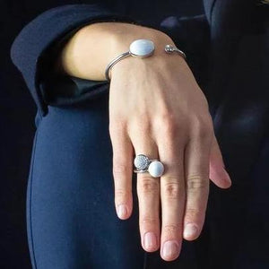 Xtinctio - This Etruscan Sphere Ring is hand made in Italy by a 3rd generation goldsmith using 925 Silver and enamel.  Engraved with our logo, it is a positive reminder of our connection to every living thing in this age of extinction. Our partner in Elephant